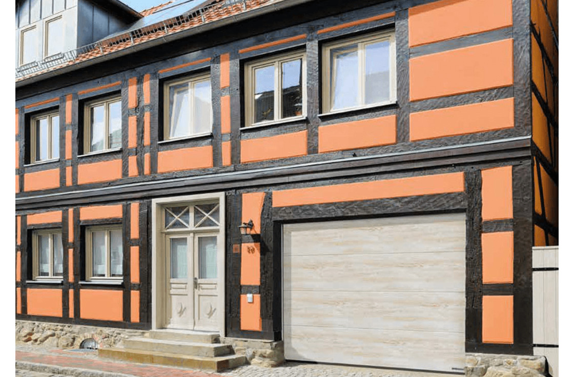Porte de garage sectionnelle finition ton bois
