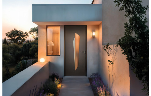 Porte d'entrée aluminium moderne avec vitrage et décor inox