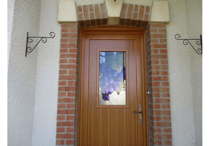 Chantier porte d'entrée en bois avec vitrage décoratif à proximité de Châlons (51)