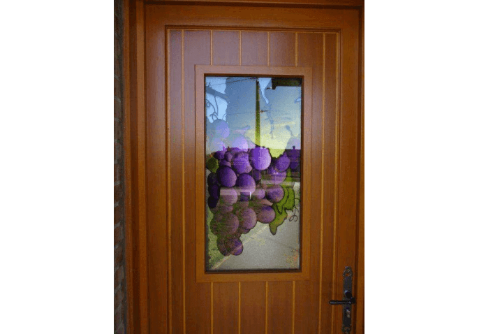 Chantier porte d'entrée en bois avec intégration d'un vitrage décoratif à proximité de Châlons (51)