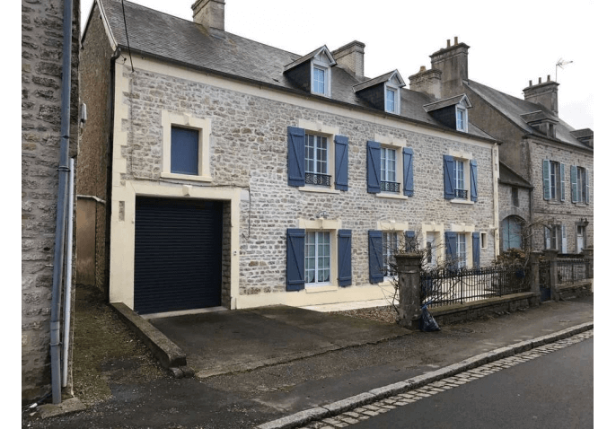 Chantier porte de garage enroulable en aluminium à Cherbourg